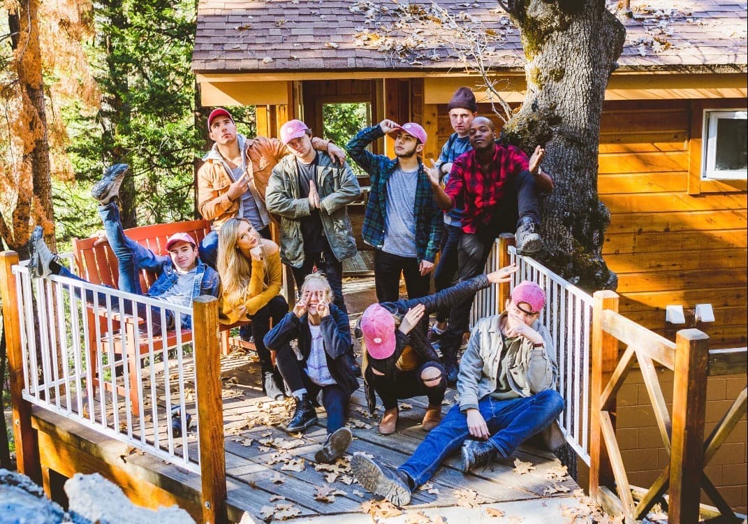 Creators at a treehouse cabin